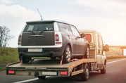 Stuck? Call Caressive—Swift Car Towing Service!